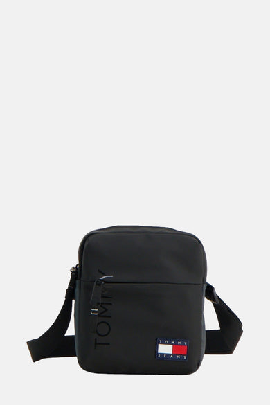 Zwarte Tommy Jeans schoudertas met ton-sur-ton verticale logo en logopatch.