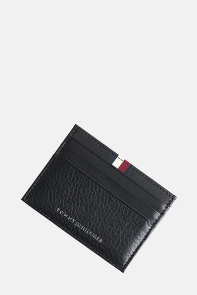 Porte-monnaie noir en cuir, de Tommy Jeans, avec des rayures bleu, blanc et rouge.