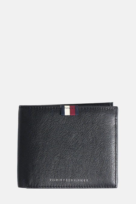 Porte-monnaie noir de TOMMY JEANS avec une bande tricolore sur le dessus.