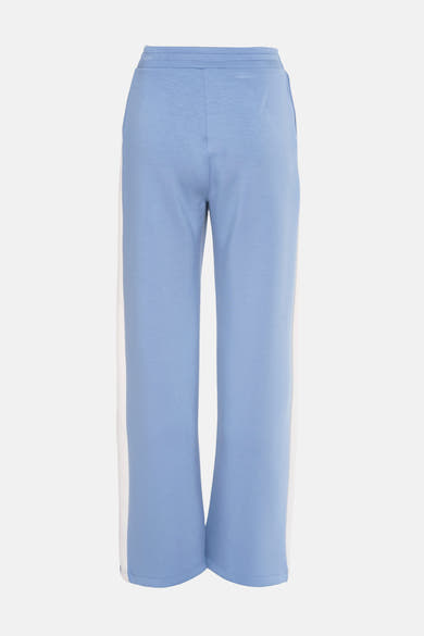 Pantalon de jogging bleu clair d'AMELIE ET AMELIE avec bandes latérales blanches.