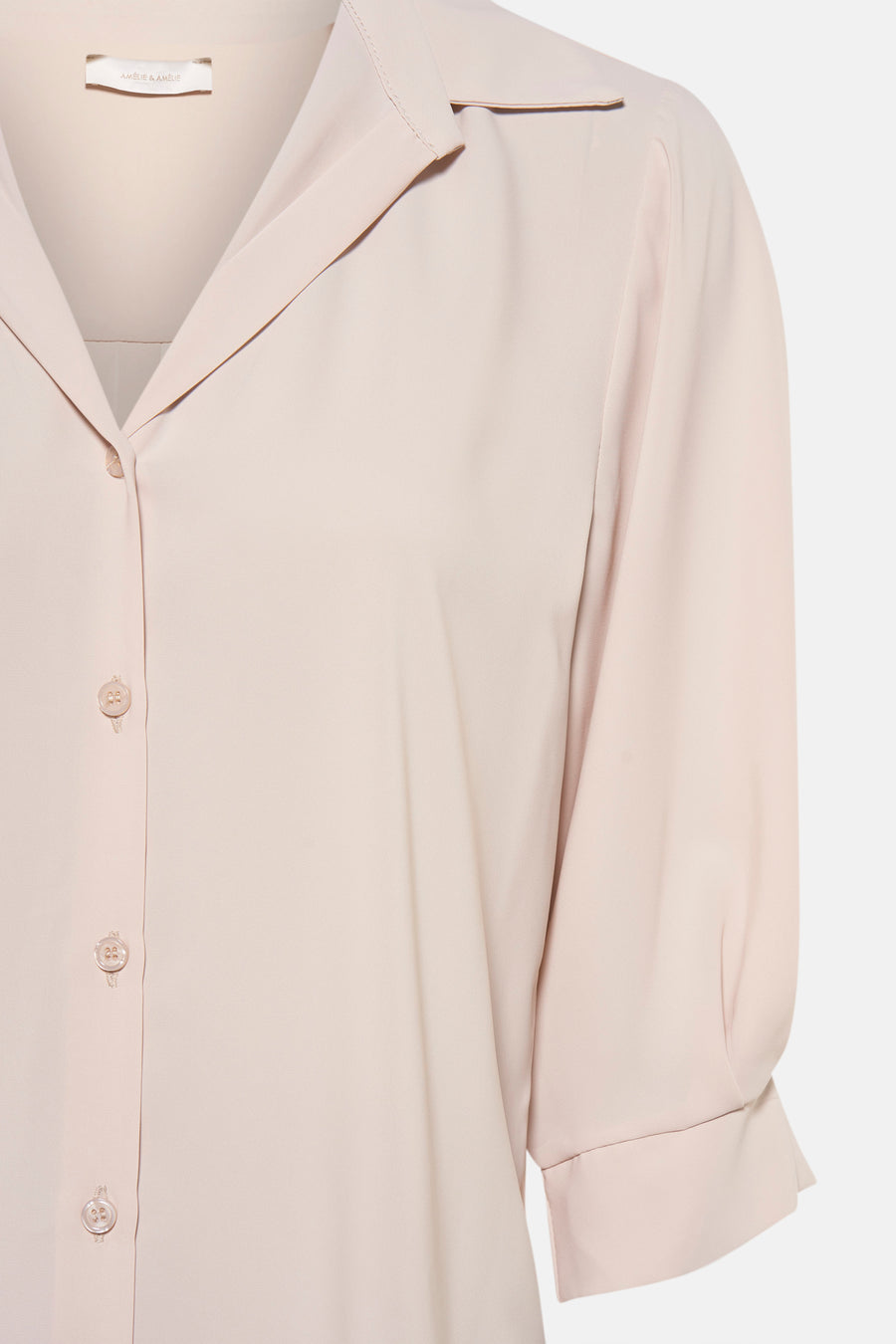 Beige blouse met korte mouwen van AMELIE ET AMELIE, met ton-sur-ton knopen.