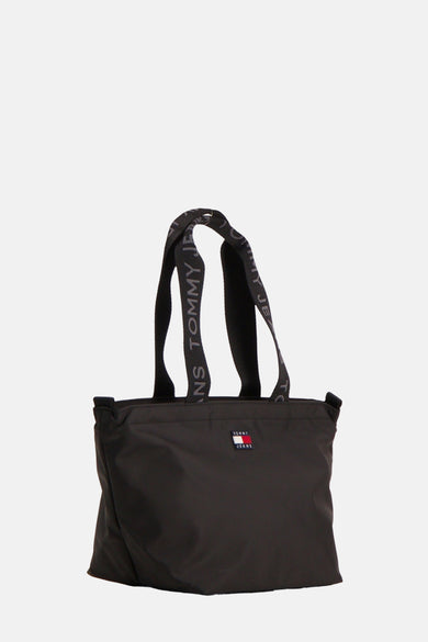 Sac à bandoulière noir de TOMMY JEANS avec des poignées à logo et un écusson de marque.