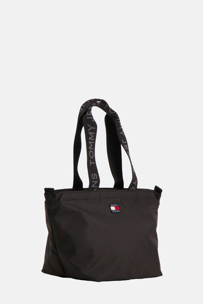 Sac à bandoulière noir de TOMMY JEANS avec des poignées à logo et un écusson de marque.