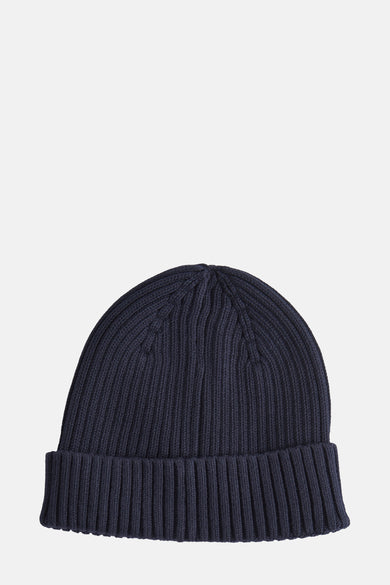 Marineblauwe muts van TOMMY JEANS in dikke ribgebreide stof.