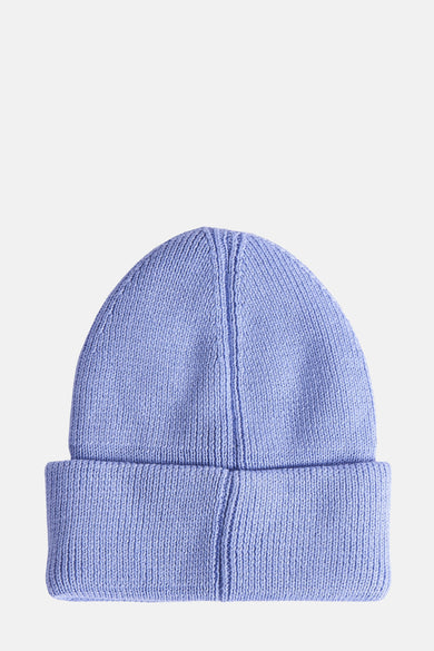 Blauwe muts van TOMMY JEANS in ribgebreide stof, met omgeslagen rand en centrale naad.