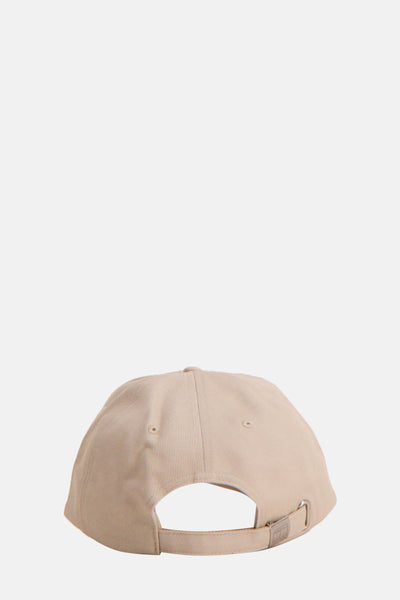 Beige pet van TOMMY JEANS, van achteren gezien, met metalen gespsluiting.