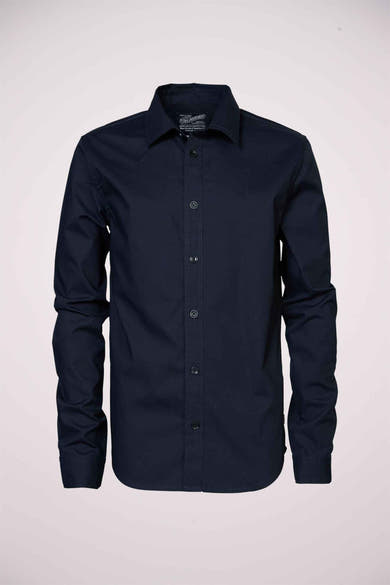 Chemise manches longues bleu par Petrol Industries®, avec fermeture boutonnée sur le devant.