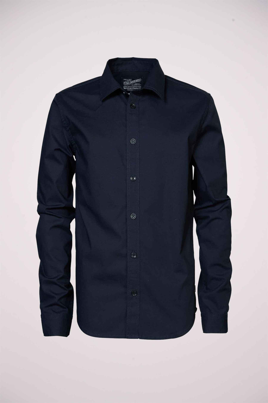 Chemise manches longues bleu par Petrol Industries®, avec fermeture boutonnée sur le devant.