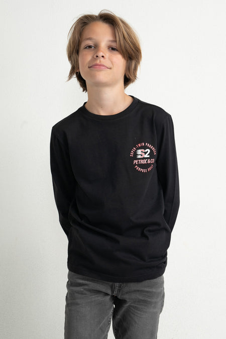 Black long-sleeve T-shirt by Petrol & Co with red and white chest logo, worn by a boy in front view.