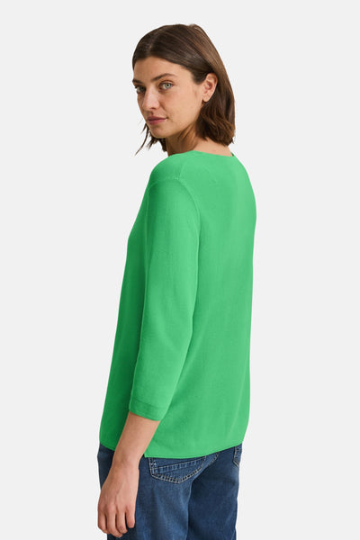 Rondearmurk groen CECIL, gedragen met een blauwe katoenen jeans, zijkant.
