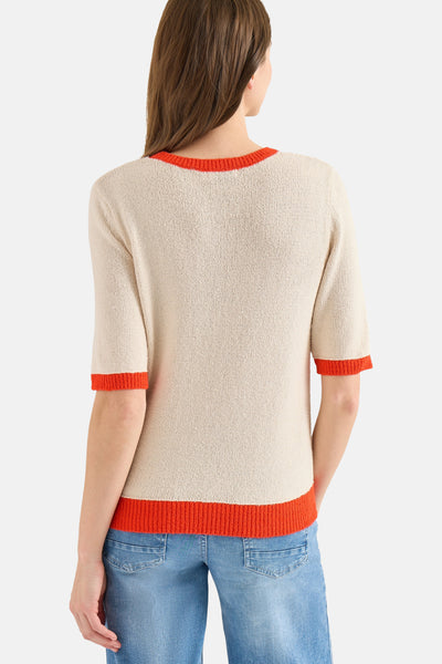 Beige gebreide trui van CECIL, met oranje randen aan de kraag, mouwen en zoom.