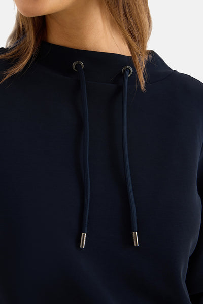 Sweat à capuche bleu de CECIL, avec cordon de serrage et œillets décoratifs.