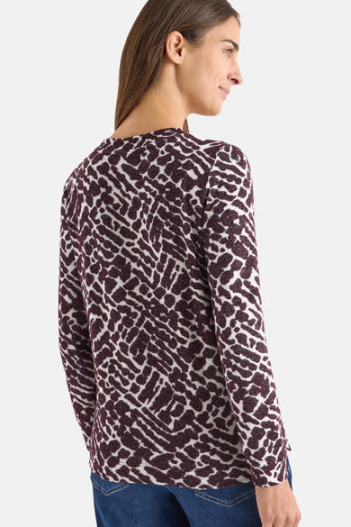 Multikleurig T-shirt met lange mouwen van CECIL, met een abstract patroon op een witte achtergrond.