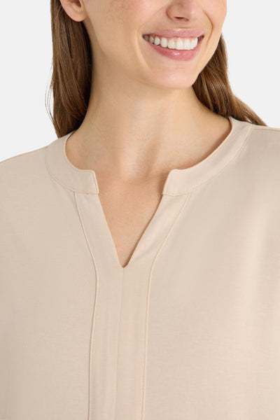 Beige blouse met lange mouwen van CECIL, met V-hals en stikseldetails.