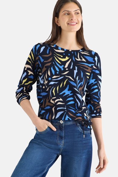 Multikleuren T-shirt met lange mouwen van CECIL, met een abstract patroon in blauw, geel en bruin.