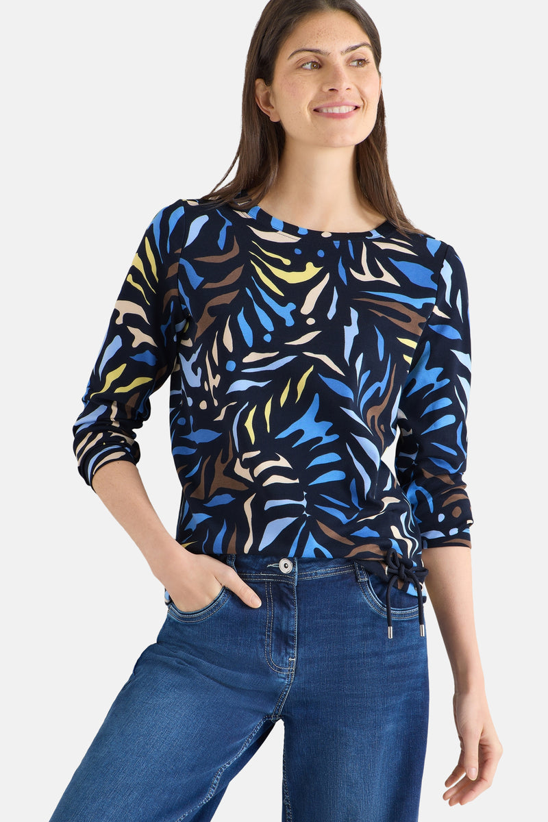 Multikleuren T-shirt met lange mouwen van CECIL, met een abstract patroon in blauw, geel en bruin.