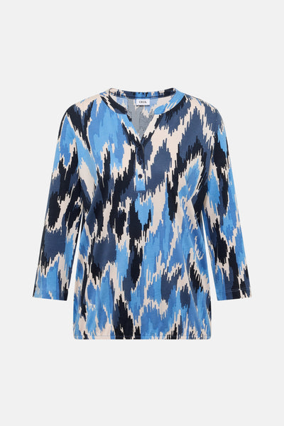 Multikleurige blouse met lange mouwen van CECIL, met een abstract blauw, zwart en beige patroon, en een knoopsluiting.