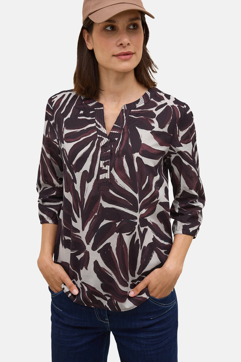 Bordeaux blouse met lange mouwen van CECIL, met een abstract bladmotief en een V-hals met knopen.