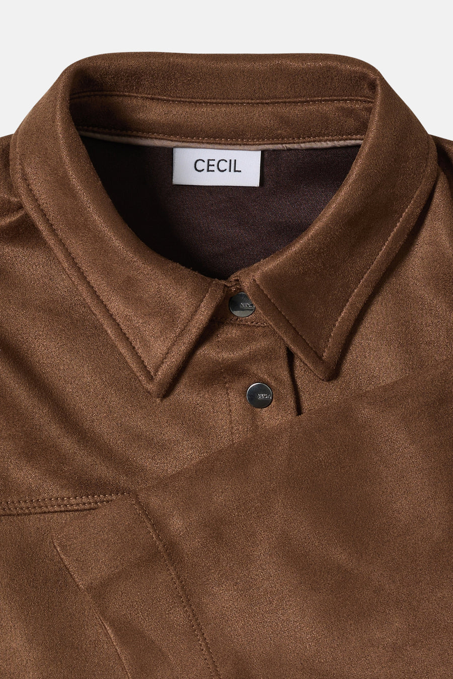 Chemise marron à manches longues de CECIL, avec col et boutons en métal apparents.
