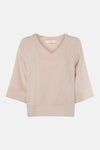Ecru long-sleeve blouse with V-neck and ribbed texture by Amélie & Amélie, front view, cropped hem and cuffs