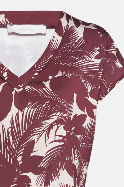 Blouse à manches courtes multicolore de AMELIE ET AMELIE avec un motif tropical.