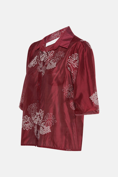 Rood overhemd met korte mouwen van AMELIE ET AMELIE, met wit bloemenpatroon.