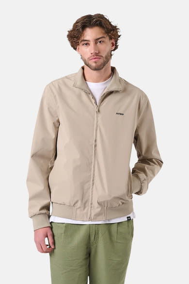 Beige regenjas van ANTWRP, met ritssluiting en opstaande kraag.