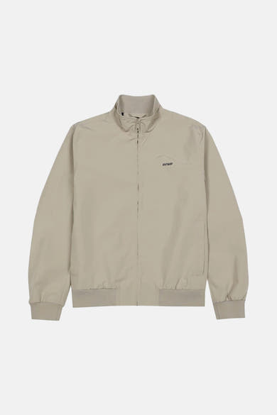 Veste de pluie beige de ANTWRP, avec fermeture éclair et col montant.