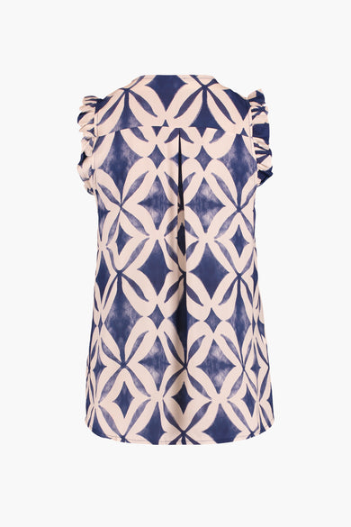 Sleeveless blue and cream geometric-patterned blouse with ruffled shoulders, back view