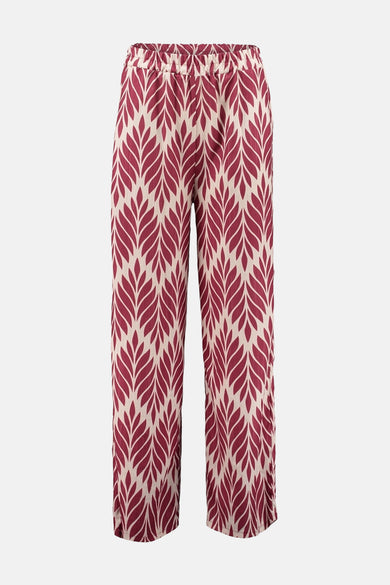 Pantalon multicolore de ZABAIONE avec un motif de feuilles bordeaux sur fond beige.