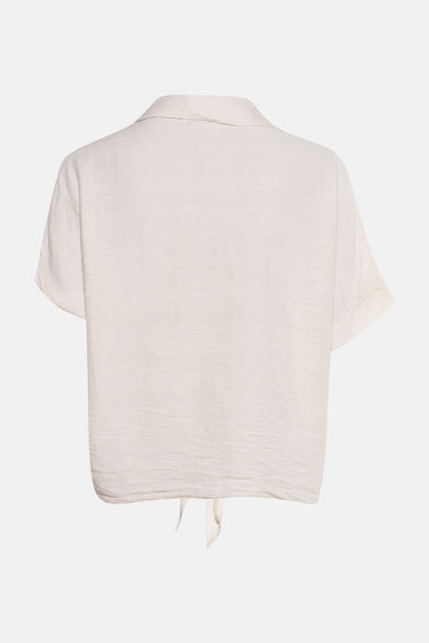 Beige T-shirt met korte mouwen van ZABAIONE, met een subtiele textuur en een strikdetail aan de onderkant.