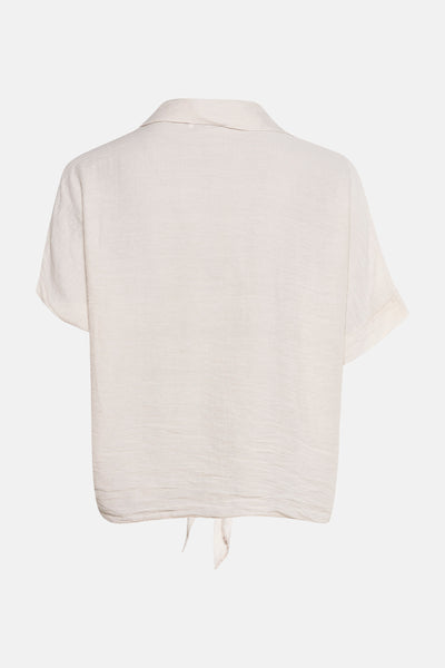Beige T-shirt met korte mouwen van ZABAIONE, met een subtiele textuur en een strikdetail aan de onderkant.