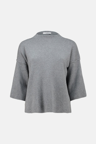 Pull à col roulé gris de Zabaione, en maille fine et manches trois-quarts.
