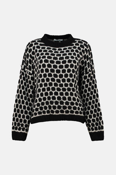 Pull à col rond noir de ZABAIONE avec un motif géométrique contrastant noir et blanc.
