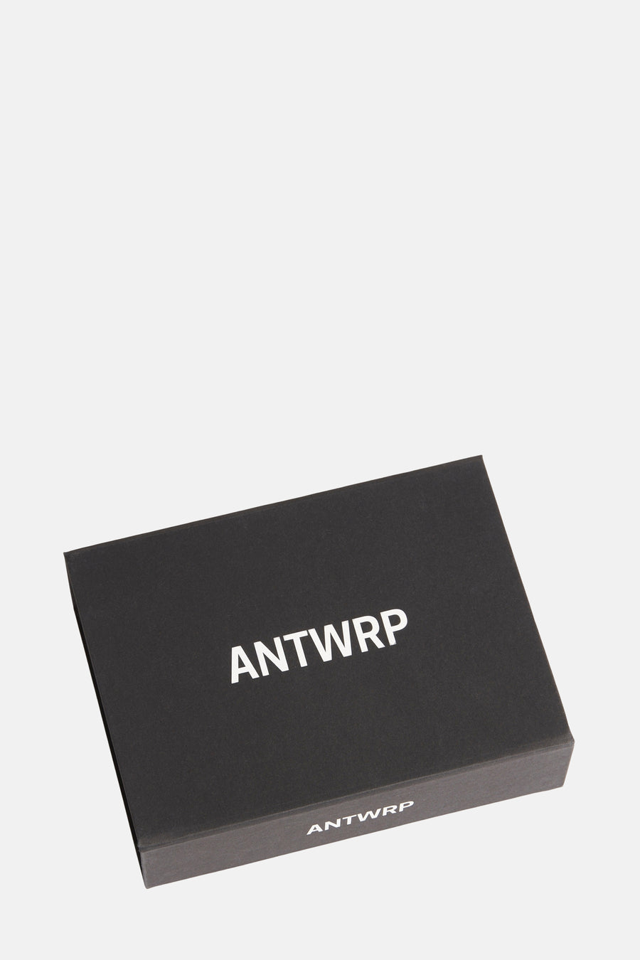 Pack de chaussettes multicolores de ANTWRP, présentées dans une boîte noire avec le logo imprimé.
