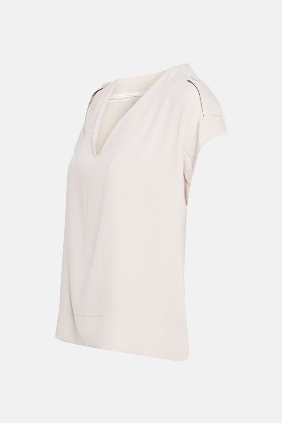 Blouse beige à manches courtes de AMELIE ET AMELIE, avec encolure en V et détails aux épaules.
