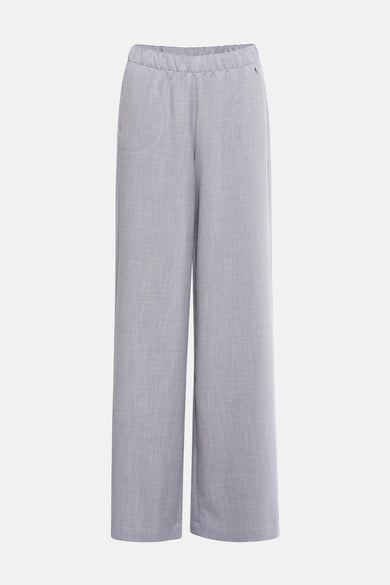 Gemêleerde blauwe broek van AMELIE ET AMELIE, met een decoratief metalen hartdetail.
