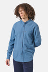 Blauwe blouse met lange mouwen van ANTWRP, met borstzak en knopen.