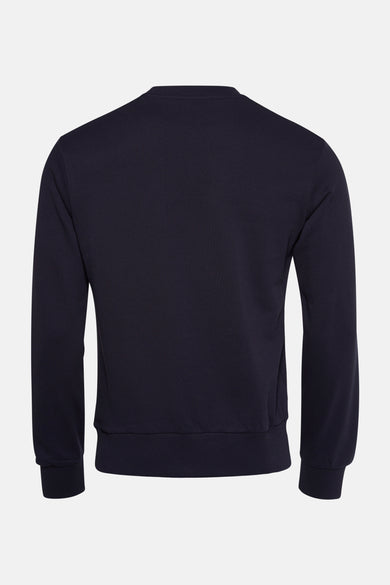 Sweat bleu de ANTWRP, en jersey uni, avec col rond et bords côtelés.