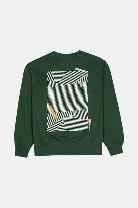 Groene ANTWRP sweater met geometrisch strepenpatroon op de rug.