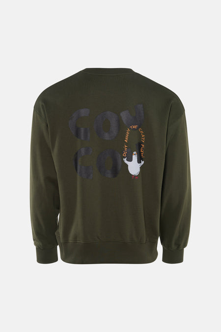 Kaki sweatshirt van ANTWRP, met "don't annoy the crazy pigeon" print op de rug.