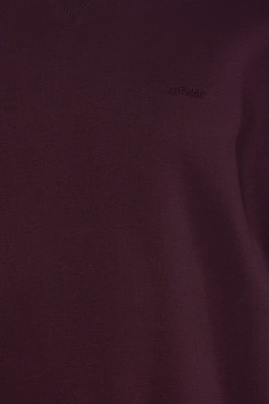 Bordeaux O-neck sweatshirt by Antwerp with subtle embroidered logo, close-up front view, soft knit texture