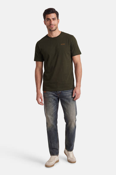 T-shirt kaki à manches courtes de ANTWRP, porté avec un jean et des baskets beige.