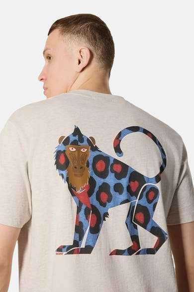 T-shirt beige à manches courtes de ANTWRP avec un imprimé singe bleu et rouge au dos.