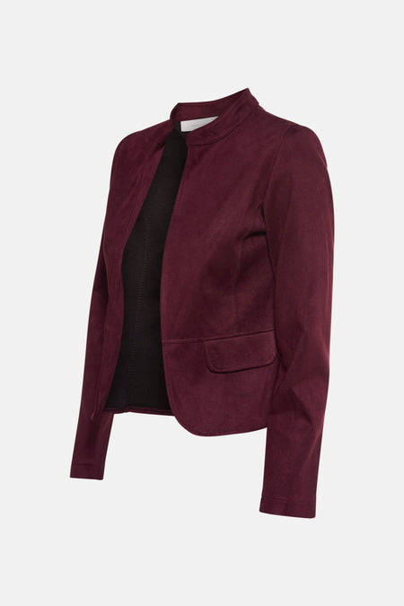 Veste courte bordeaux en suédine d'AMELIE ET AMELIE, avec col montant et poche plaquée.