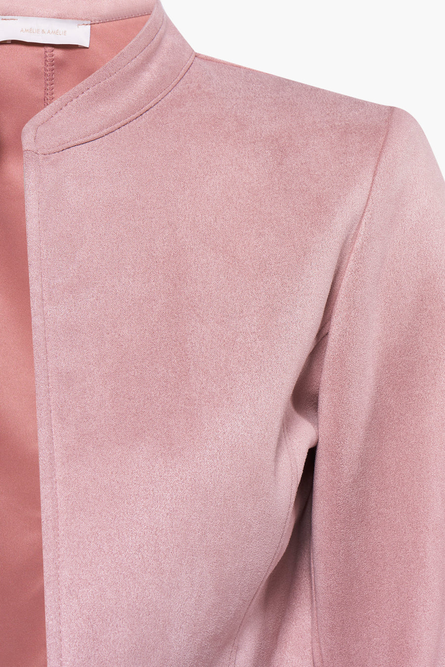 Rose pink blazer by Amélie & Amélie, close-up front view showcasing soft textured fabric and stand collar detail