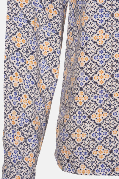Chemisier à manches courtes multicolore de NAF NAF avec un motif floral bleu et orange.
