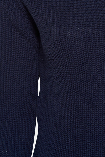 Ronde hals trui van NAF NAF in marineblauw textuur breisel, met zichtbare mouw en lijf.