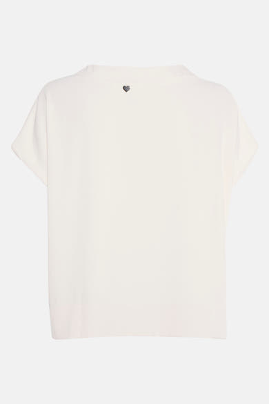 Beige blouse met korte mouwen van AMELIE ET AMELIE met een decoratief hartdetail op de rug.