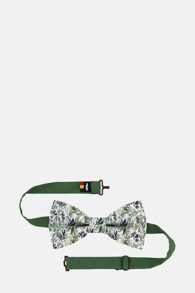 Nœud papillon vert à motifs végétaux par MR. CELESTIN, avec une lanière de cou verte et une étiquette de marque.
